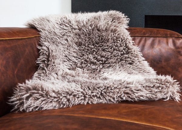 Ultimate Furniture Cleaning Guide: Our Lanna sheepskins are the perfect place to take a long winter's nap. Dry clean only, please!