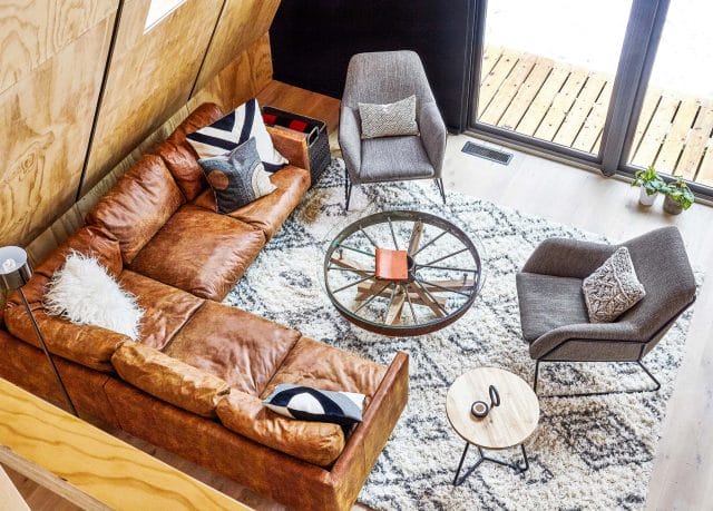 An Article leather sectional in the Lokal Hotel's A-frame cabin