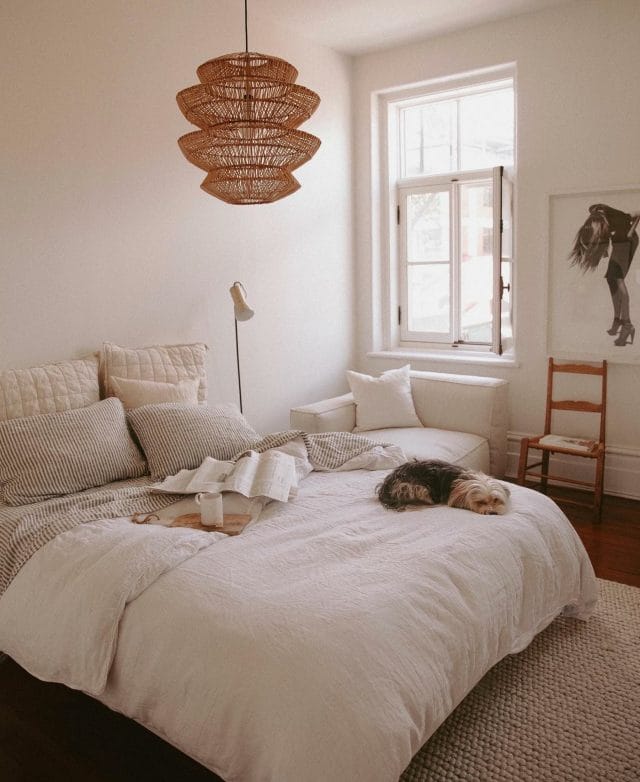 Chloe Cleroux uses the Article Suru Pendant Light in her calm bedroom